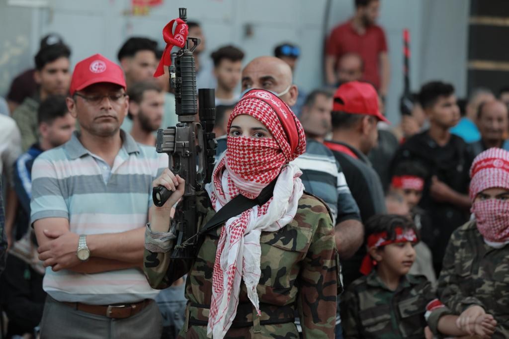 الآلاف من أنصار الجبهة الشعبيةيشاركون في المسيرة الضخمة احتفالاً بانتصار المقاومة (3).jpg